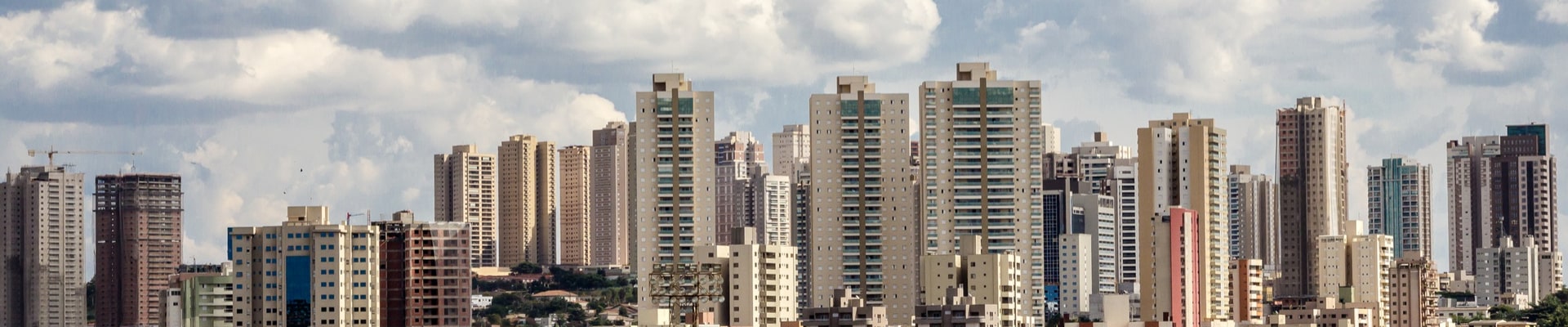 Real estate investments banner representing the commercial backdrop to the Bhosale PMLA matter